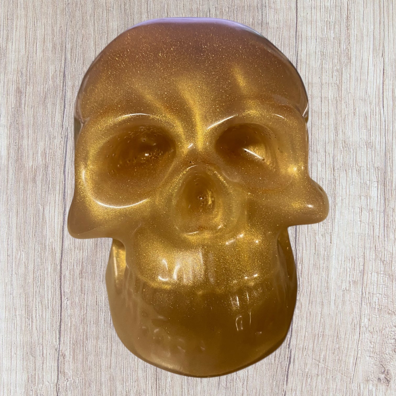 Tête de squelette en résine or ou bronze