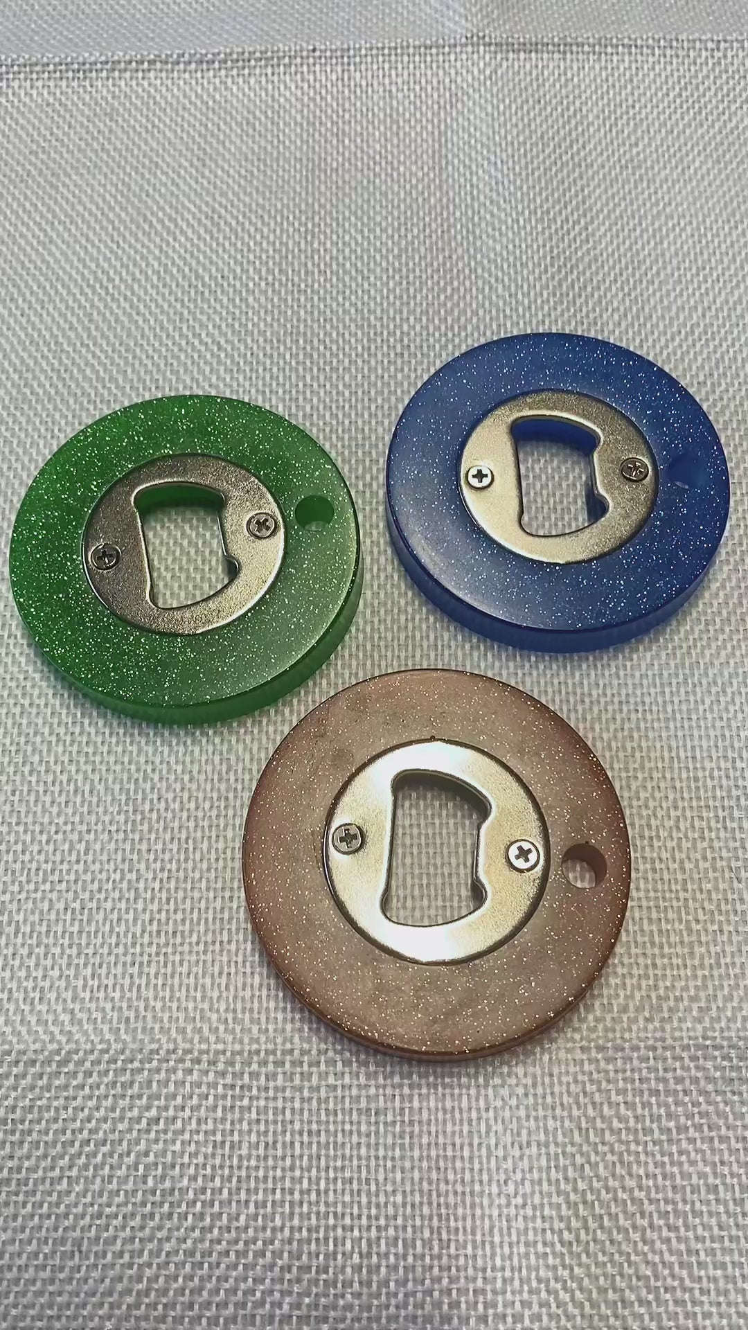 Décapsuleur PHOSPHORESCENT  rond  en résine couleurs variés